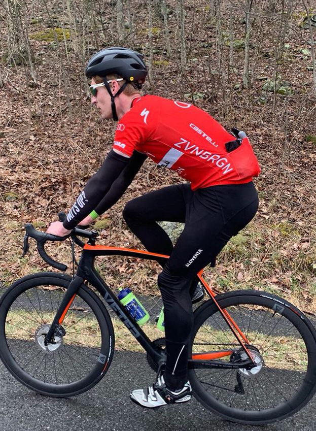 road-racer-in-red-racing-suit-black-helmet-riding-LB-R45-45mm-deep-aero-wheels-on-fireroads.jpeg